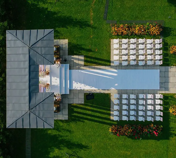 An aerial view of a wedding ceremony.