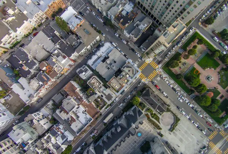 A bird 's eye view of the city streets and buildings.